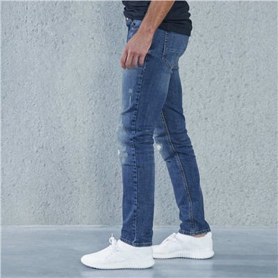 Узкие джинсы с потертостями - голубой