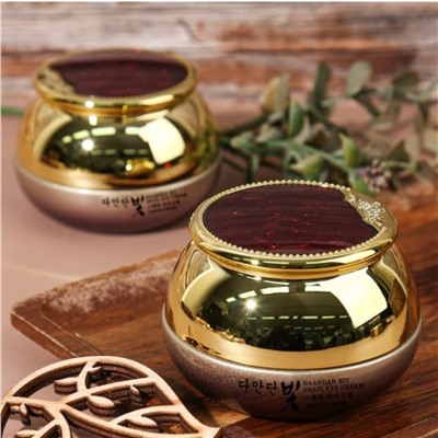 Jigott Питательный крем для век с муцином улитки / Daandan Bit Snail Eye Cream, 50 мл
