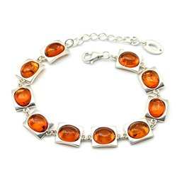 Браслет с янтарем С925 "овал в прямоугольнике" 10*12мм цв.коньячный, 19см, 14,6г