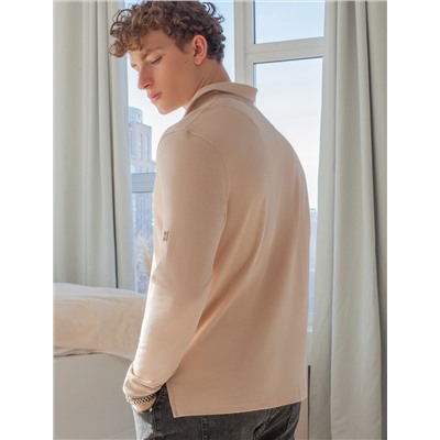 Поло из фактурного трикотажа с застежкой на пуговицы