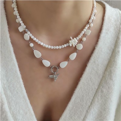 Сет из перламутра и коралла в белом металле