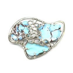 Брошь из бирюзы 44*32мм.