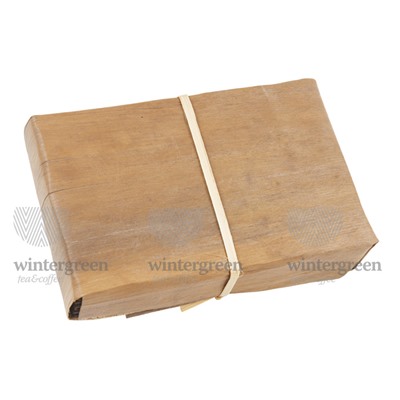 Китайский элитный чай шу пуэр Фабрика Фэн Цин 210-250 г (кирпич в листьях бамбука)