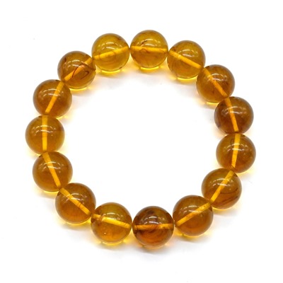 Браслет из янтаря шарик 14мм медовый